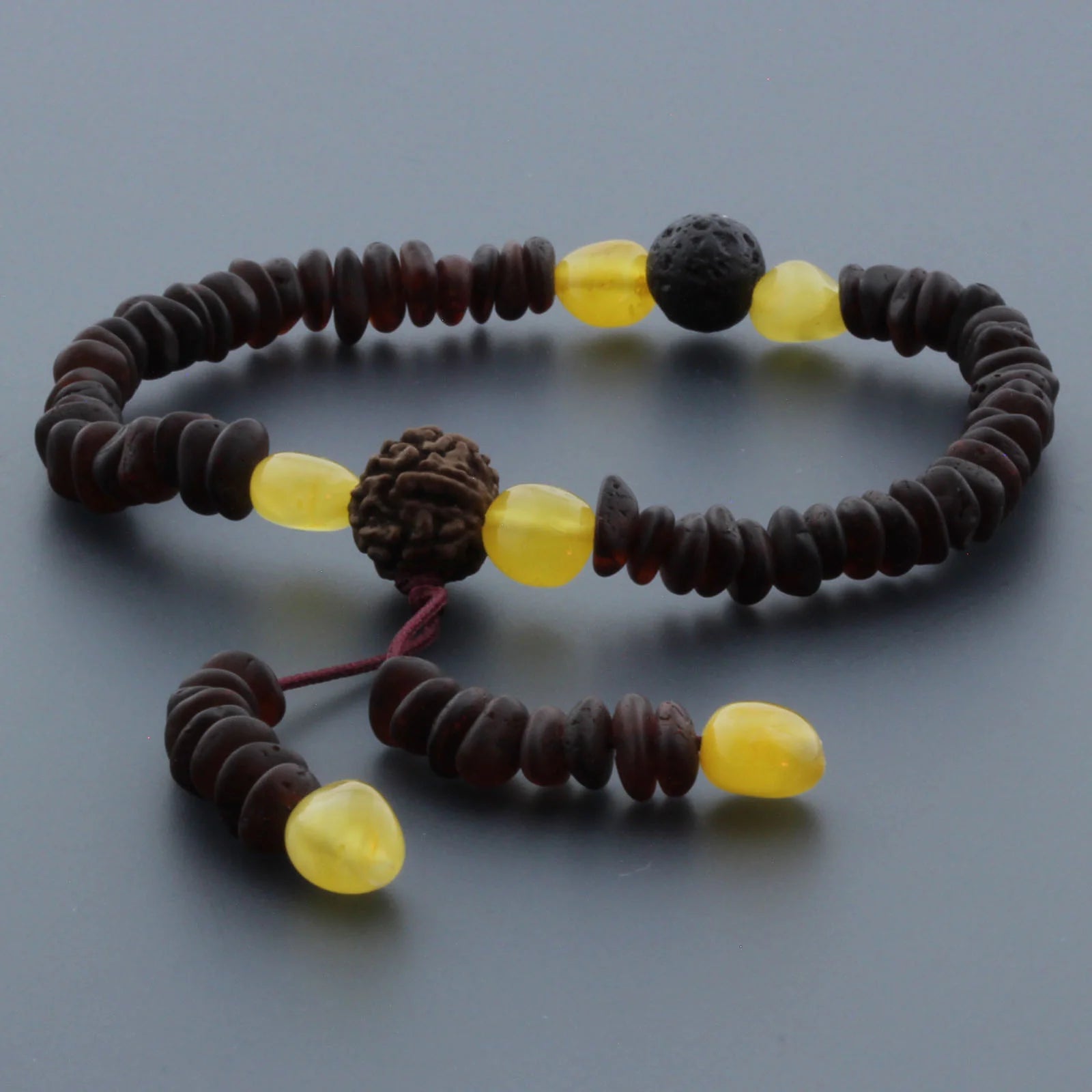 Adult Baltic Amber Bracelet with Lava Stone Mala Tassel. MS07