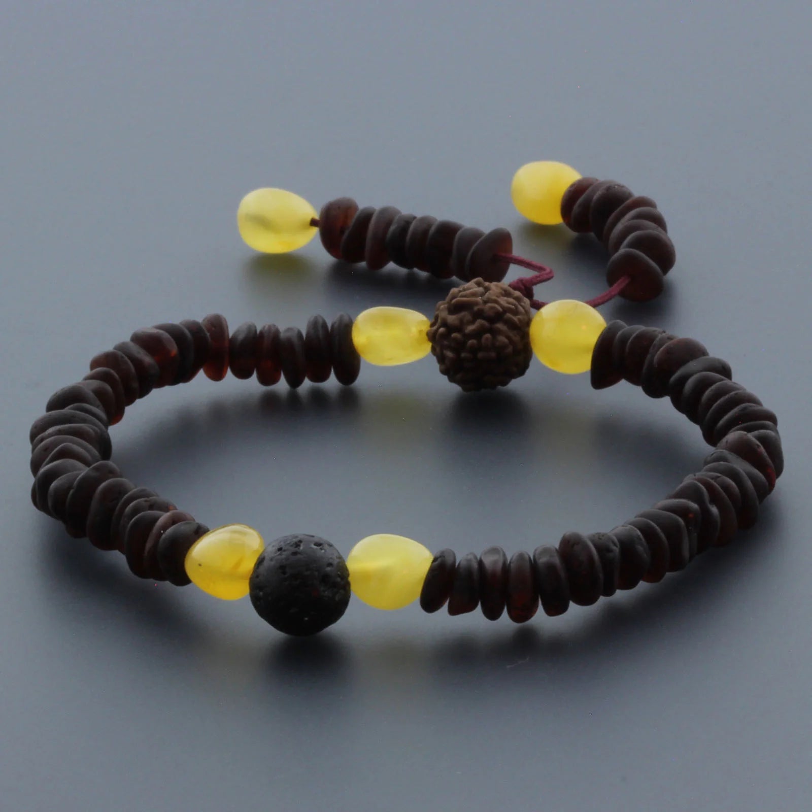 Adult Baltic Amber Bracelet with Lava Stone Mala Tassel. MS07