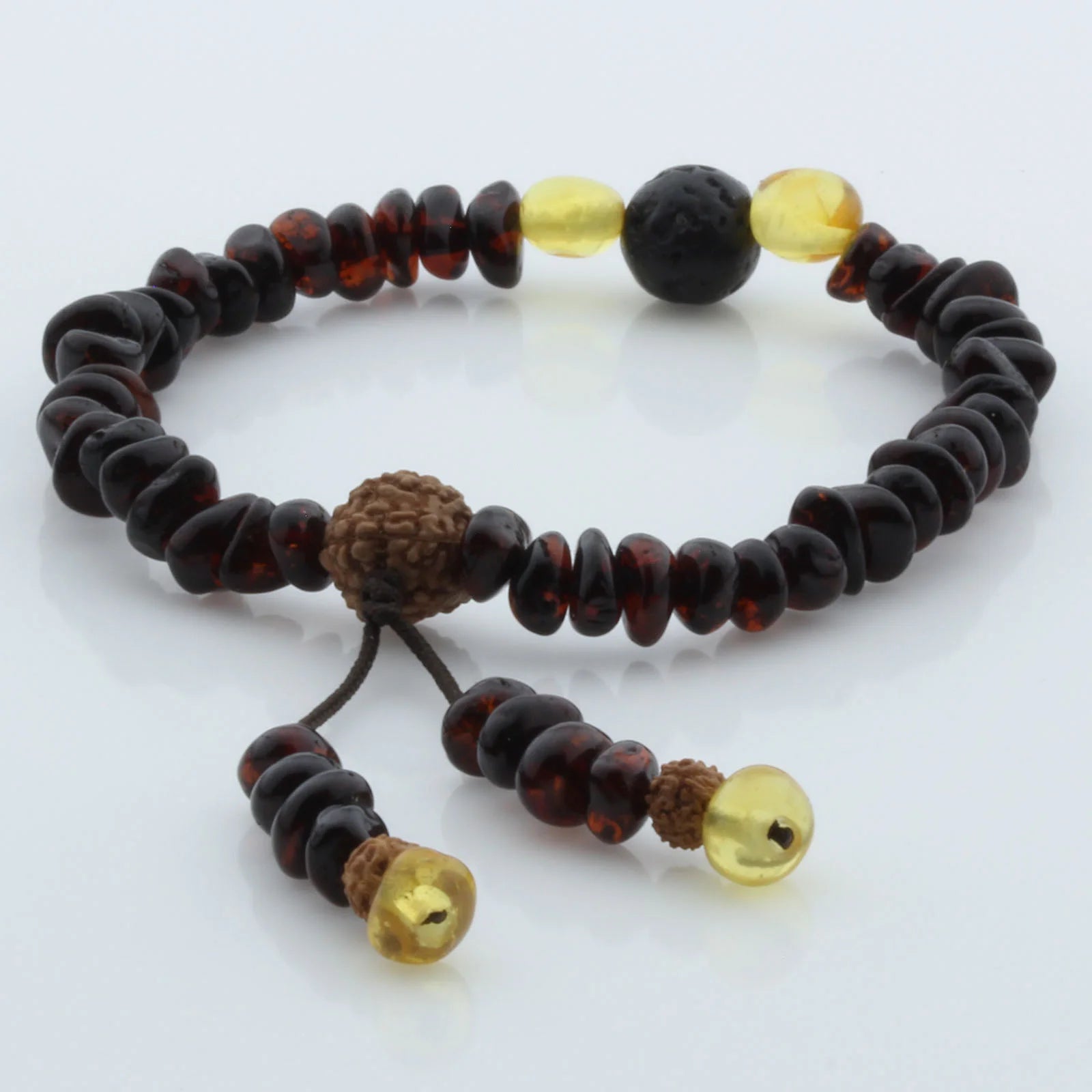 Adult Baltic Amber Bracelet with Lava Stone Mala Tassel. MS03