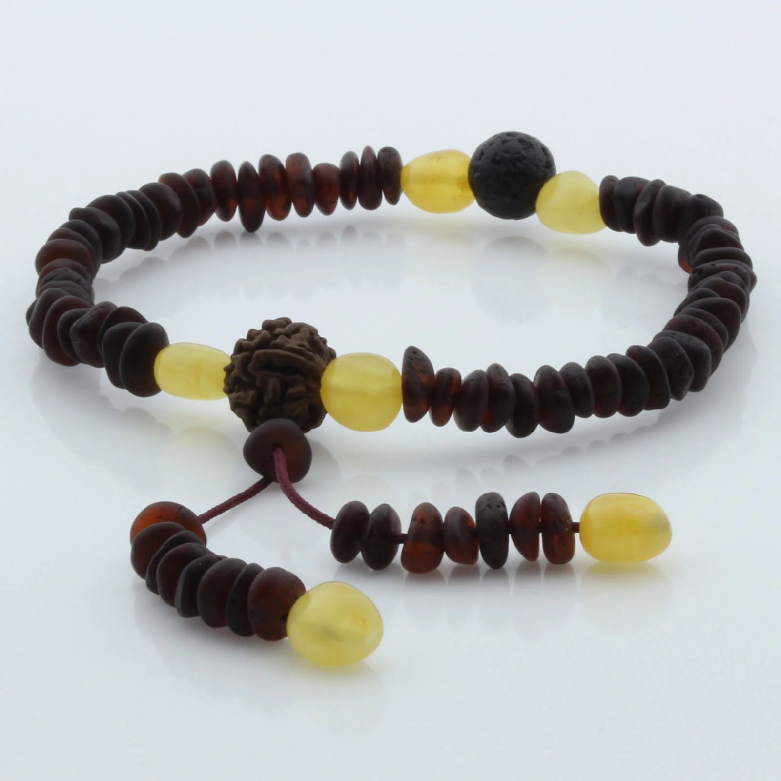 Adult Baltic Amber Bracelet with Lava Stone Mala Tassel. MS07