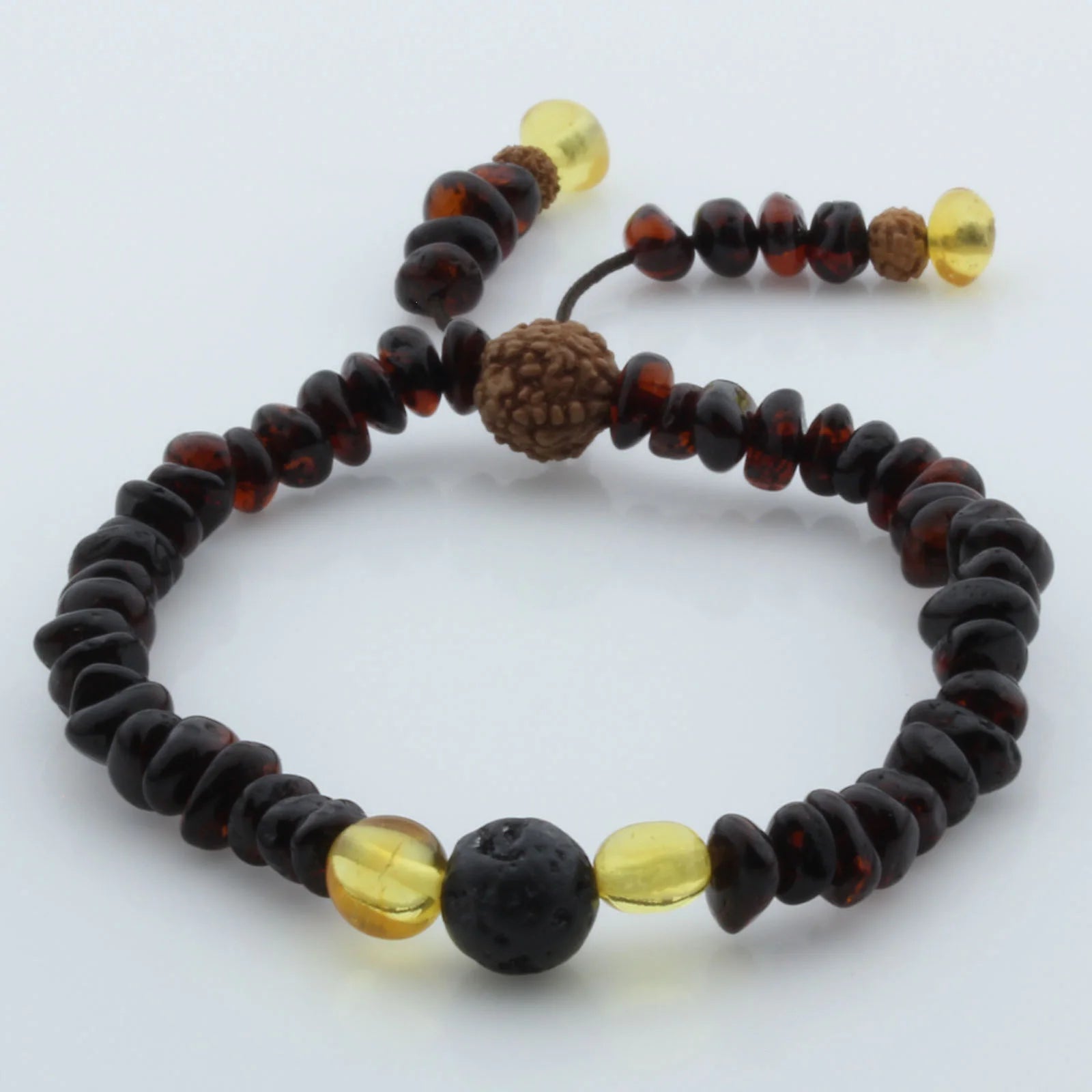 Adult Baltic Amber Bracelet with Lava Stone Mala Tassel. MS03