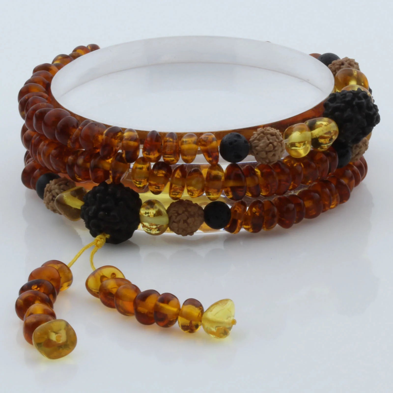Adult Baltic Amber Bracelet with Lava Stone Mala Tassel. MT04