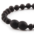 Baltic Amber Teething Bracelet. Baroque Black 5mm - XB54BM