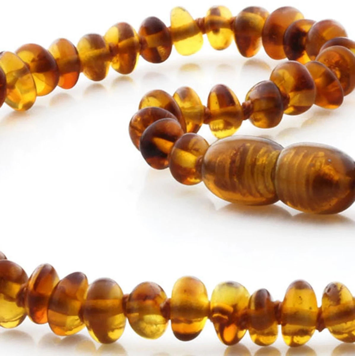 Baltic Amber Teething Necklace. Roundel Cognac 5mm - RO6