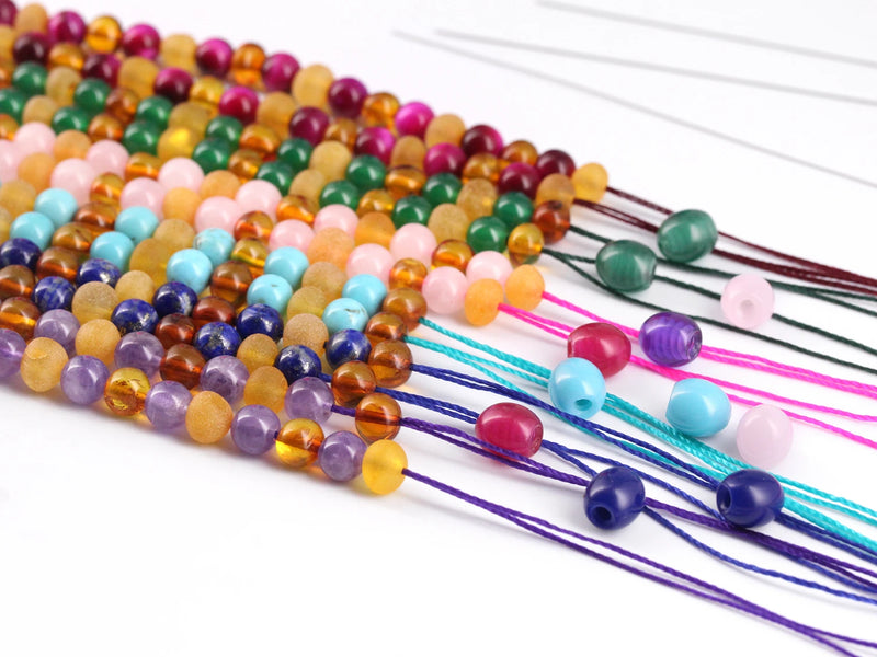 amber buddy teething necklaces stringing process